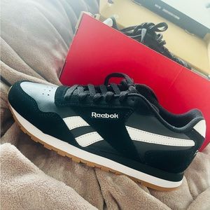 Brand new rare Reebok shoes. Black and white with bubble gum sole.